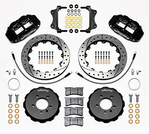 Wilwood Forged Narrow Superlite 6R Big Brake Front Brake Kit (Hat) Parts Laid Out - Black Powder Coat Caliper - SRP Drilled & Slotted Rotor