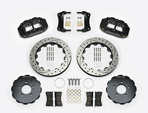 Wilwood Forged Narrow Superlite 6R Big Brake Front Brake Kit (Hat) Parts Laid Out - Black Powder Coat Caliper - SRP Drilled & Slotted Rotor