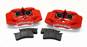 Wilwood SLC56 Front Replacement Caliper Kit Parts Laid Out - Red Powder Coat Caliper