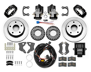 Wilwood Forged Dynalite Rear Electronic Parking Brake Kit Parts Laid Out - Black Powder Coat Caliper - Plain Face Rotor