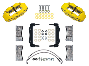 Wilwood Forged Narrow Superlite 4R Front Caliper and Bracket Kit Parts Laid Out - Yellow Powder Coat Caliper