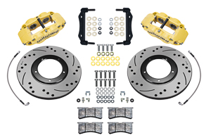 Wilwood Forged Narrow Superlite 4R Front Brake Kit Parts Laid Out - Yellow Powder Coat Caliper - SRP Drilled & Slotted Rotor