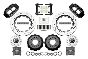 Wilwood Forged Narrow Superlite 6R Big Brake Front Brake Kit (Hub) Parts Laid Out - Black Powder Coat Caliper - SRP Drilled & Slotted Rotor