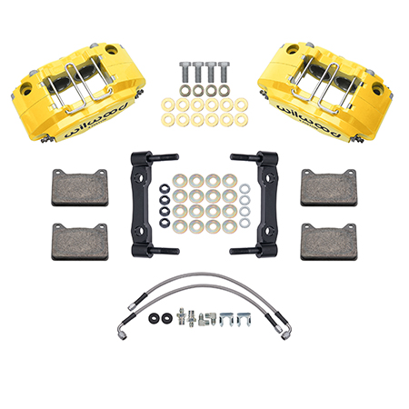 Wilwood Powerlite Front Caliper and Bracket Kit Parts Laid Out - Yellow Powder Coat Caliper