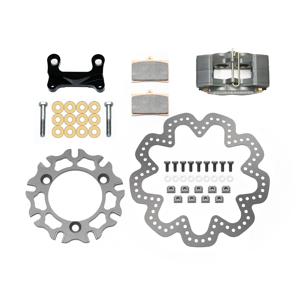 Wilwood GP320 Sprint Left Front Brake Kit Parts Laid Out - Type III Ano Caliper - Drilled Rotor