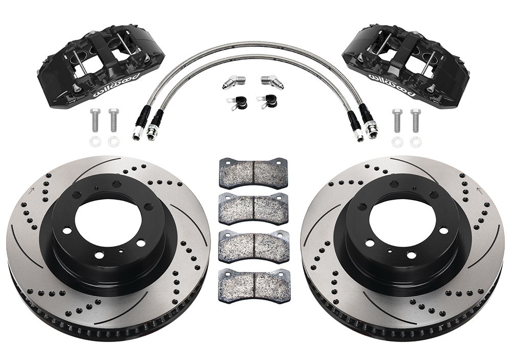 Wilwood AERO6-DM Direct-Mount Truck Front Brake Kit Parts Laid Out - Black Powder Coat Caliper - SRP Drilled & Slotted Rotor