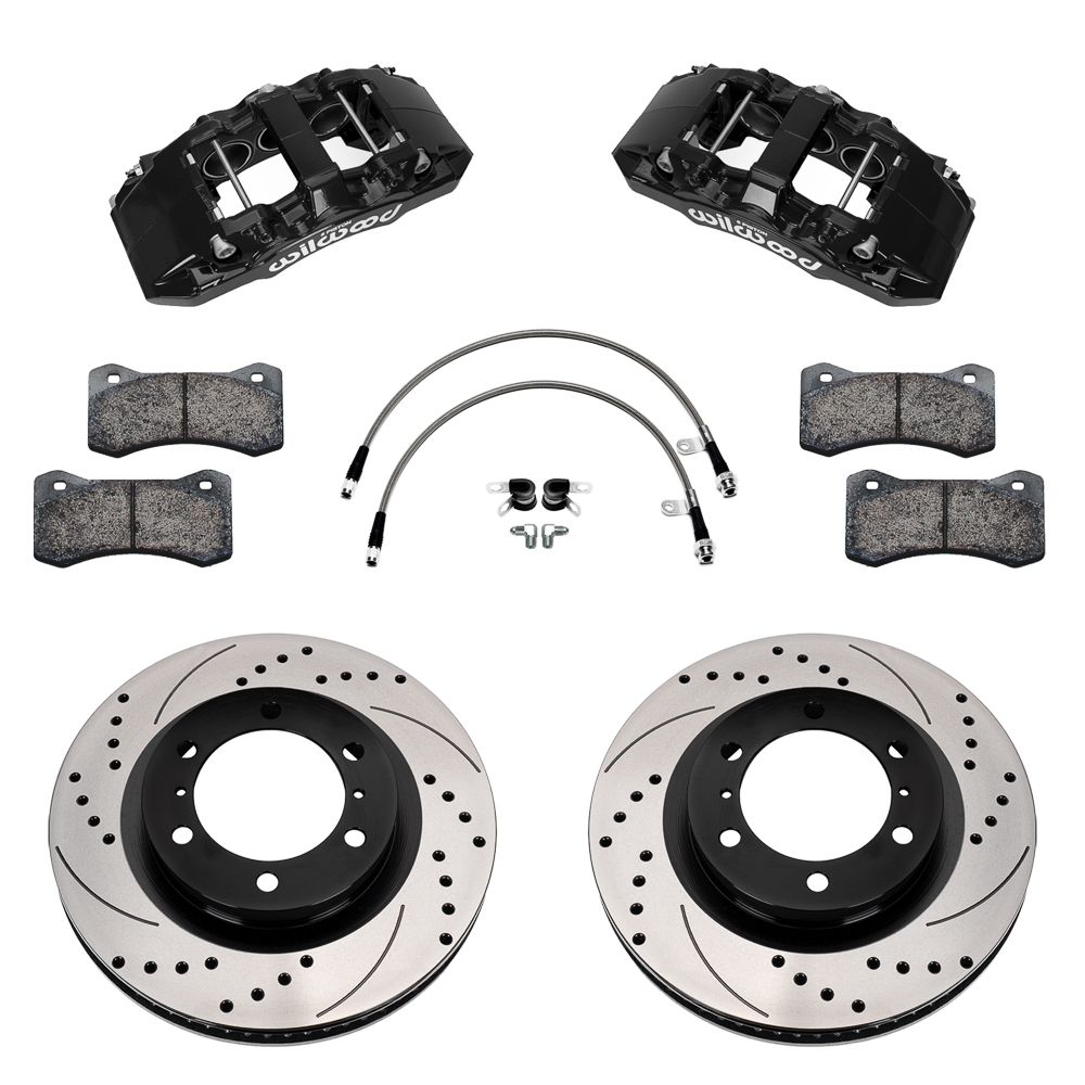 Wilwood AERO6-DM Direct-Mount Truck Front Brake Kit Parts Laid Out - Black Powder Coat Caliper - SRP Drilled & Slotted Rotor